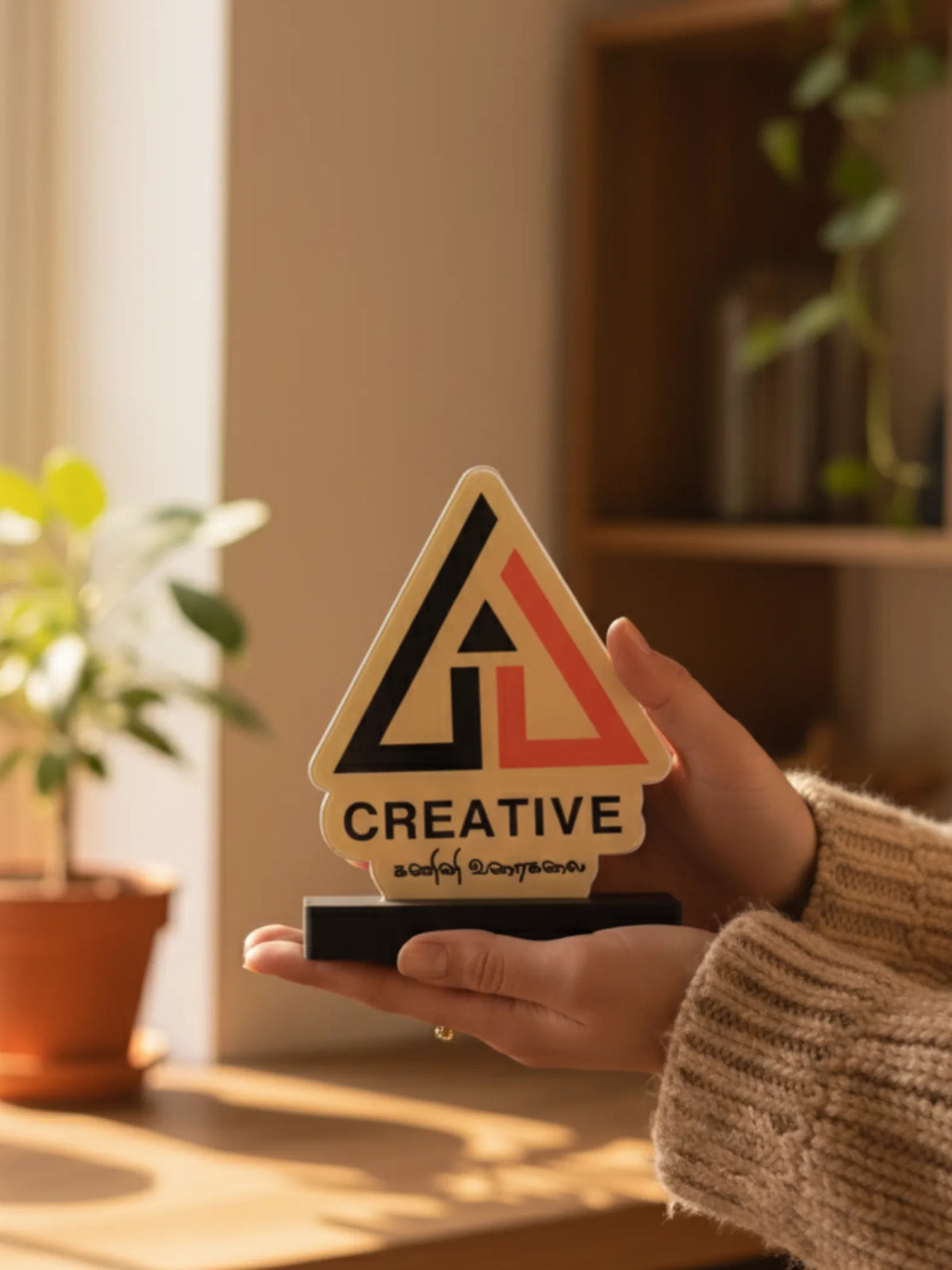 Creative Excellence Trophy - First Place Winner Award with golden finish and elegant design for competitions and achievements