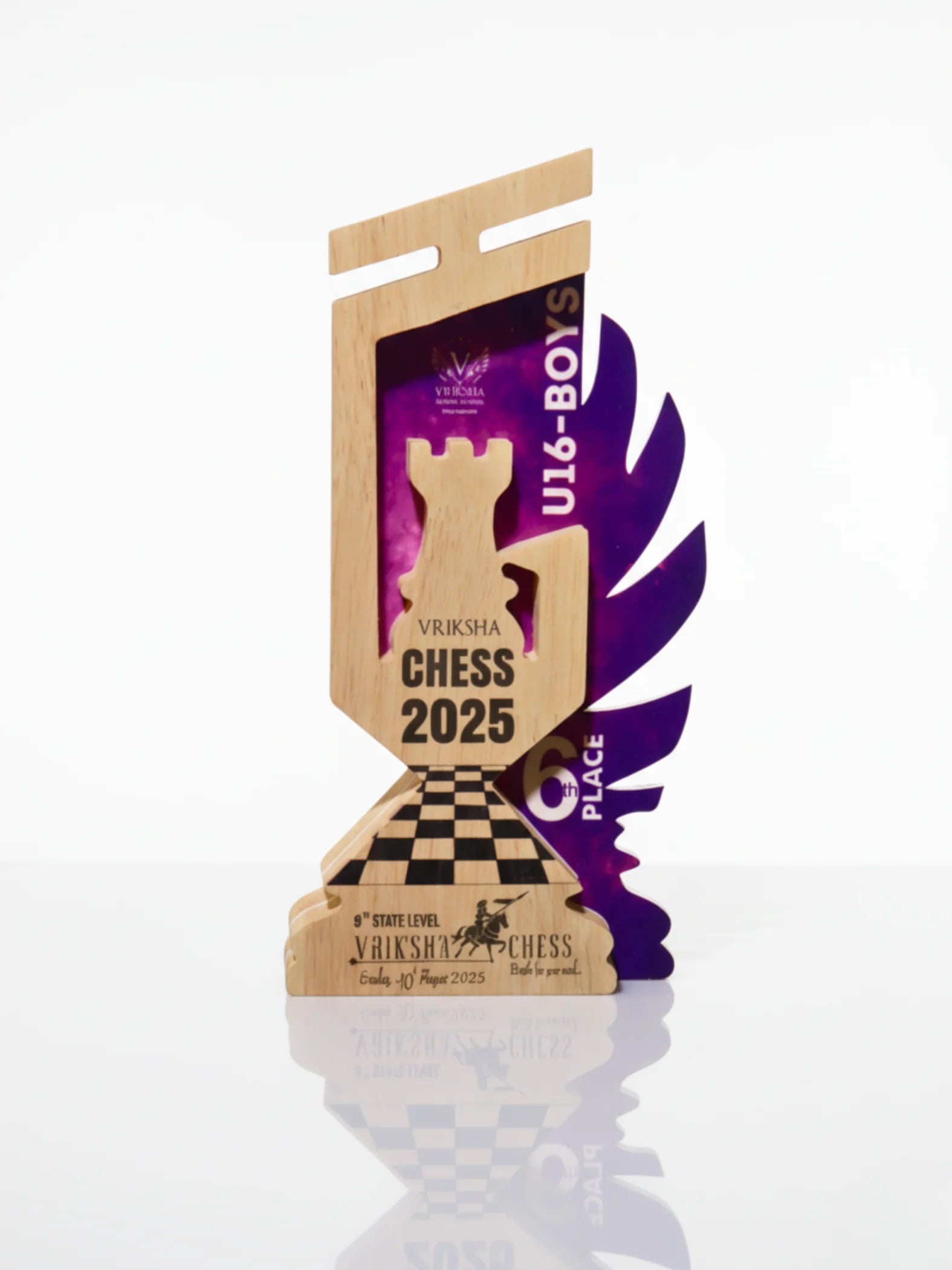 Close-up view of wooden rook chess trophy showing craftsmanship and natural wood finish