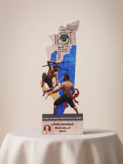 Trophy with athletes and decorative elements on a white tablecloth