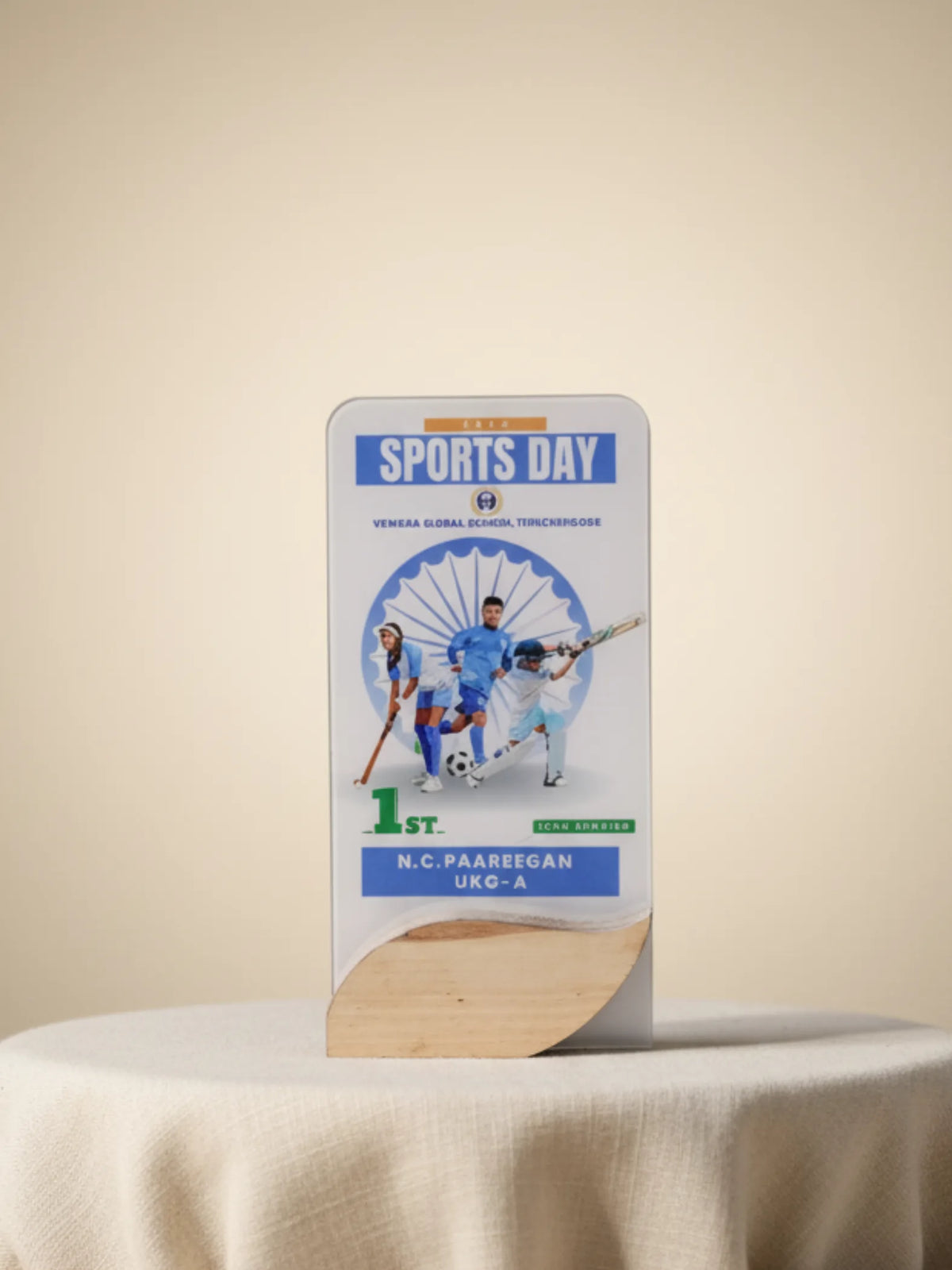 Sports day champion trophy with golden figure and engraved nameplate