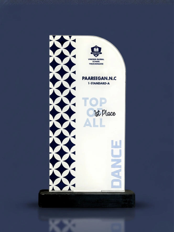 A decorative award with a blue and white pattern on a dark blue background