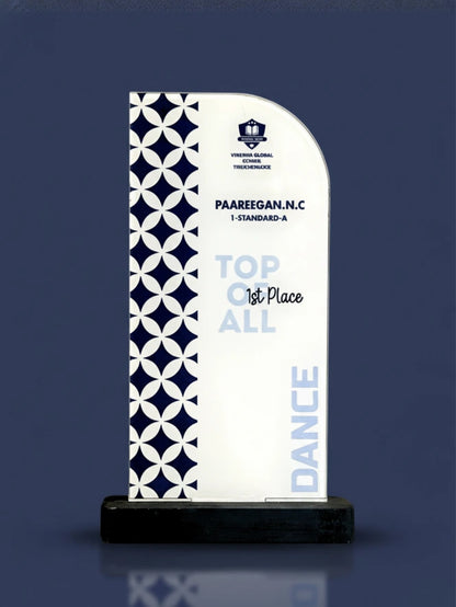 A decorative award with a blue and white pattern on a dark blue background