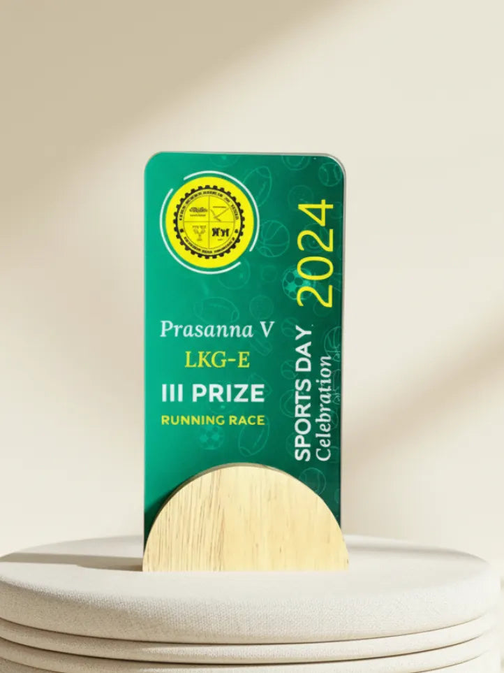 Green award plaque with yellow text and logo on a beige background