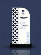 Decorative award with geometric pattern and text on a dark background