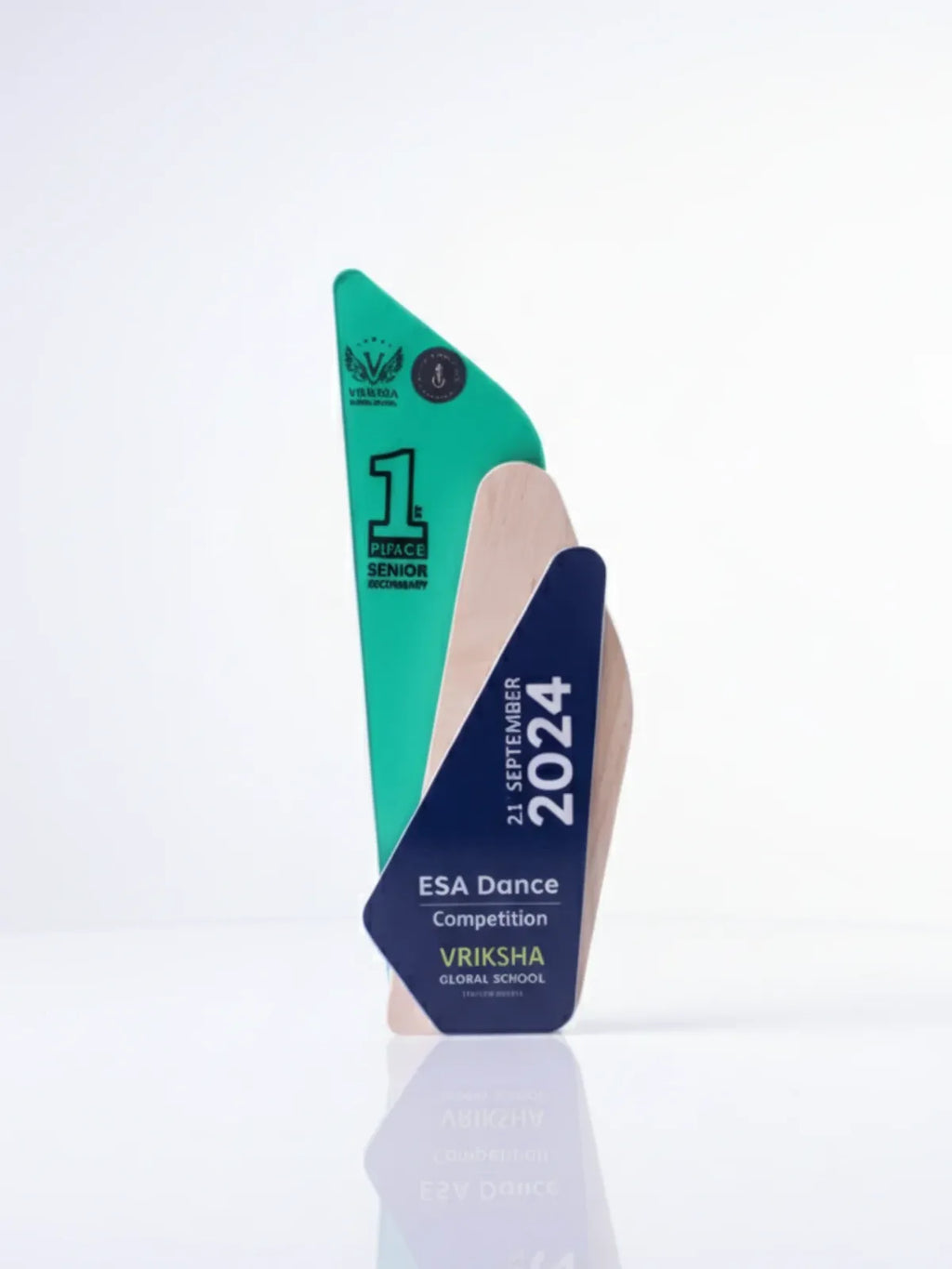 Trophy with green and blue design on a white background