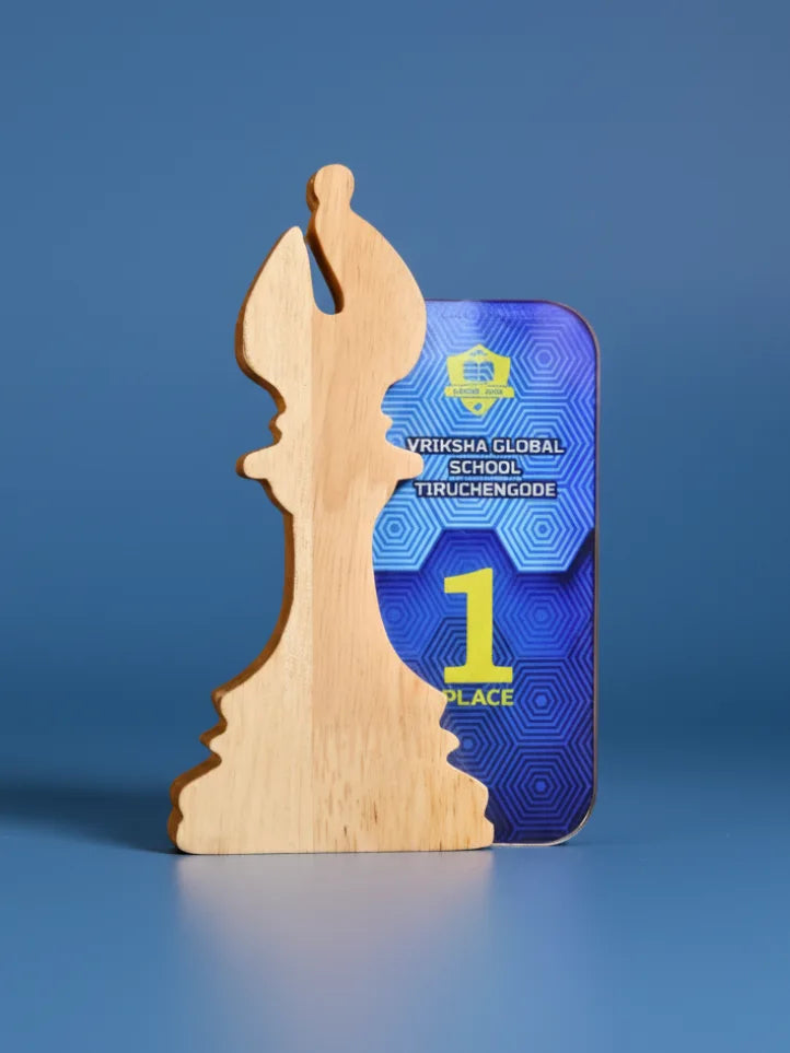 Wooden trophy with a blue card displaying '1st Place' on a blue background