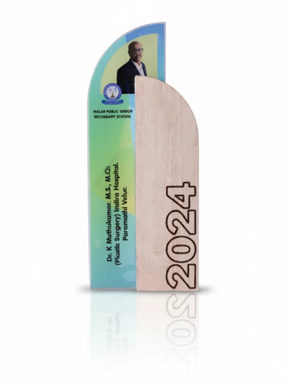 Wooden plaque with a colorful banner on a white background