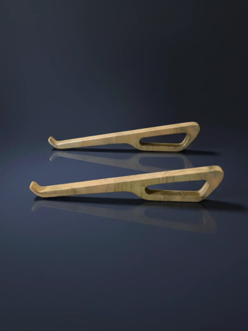 Two wooden ski runners on a reflective dark surface