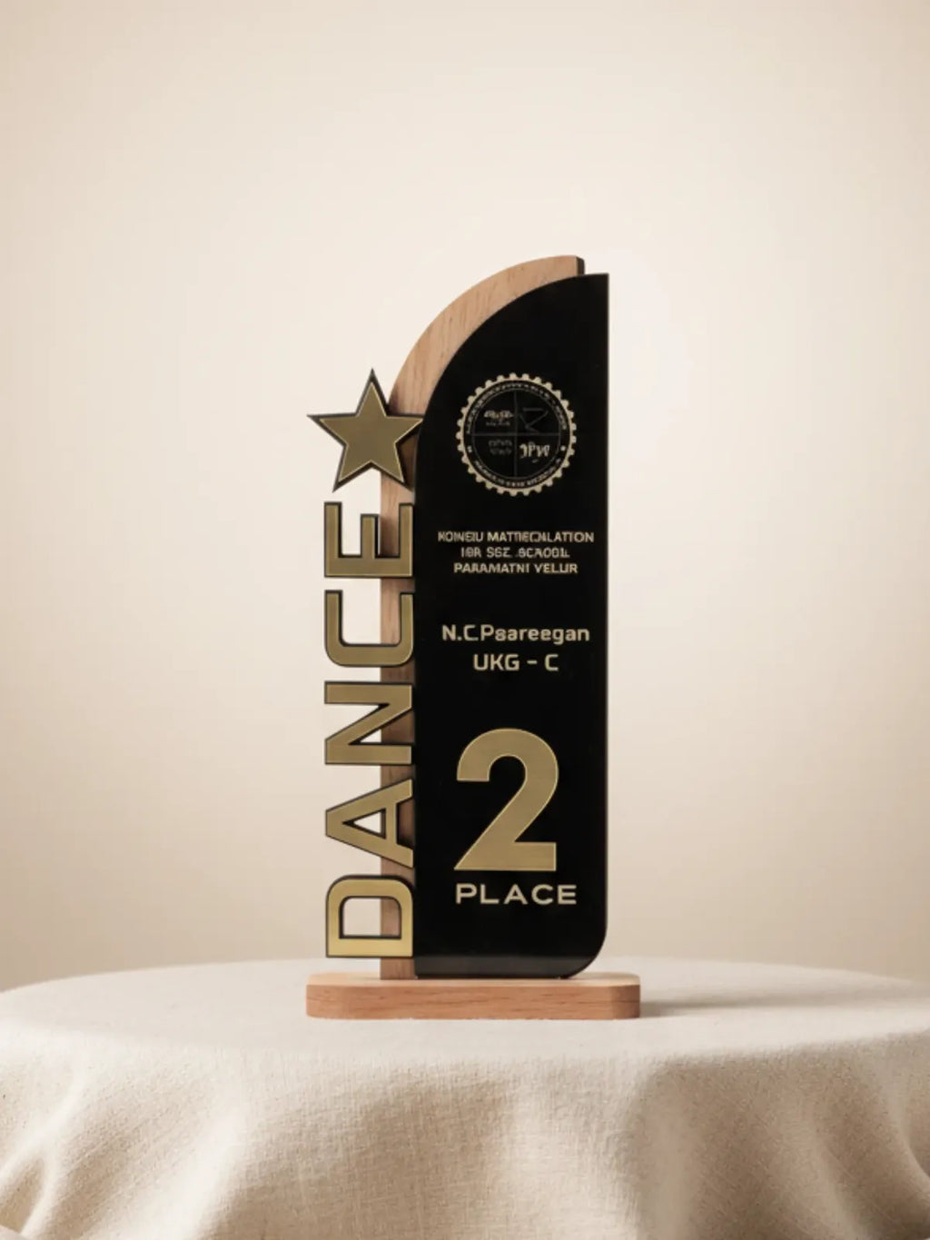 Side view of Cultural Day Best Dance Trophy showing crystal base and golden award figurine