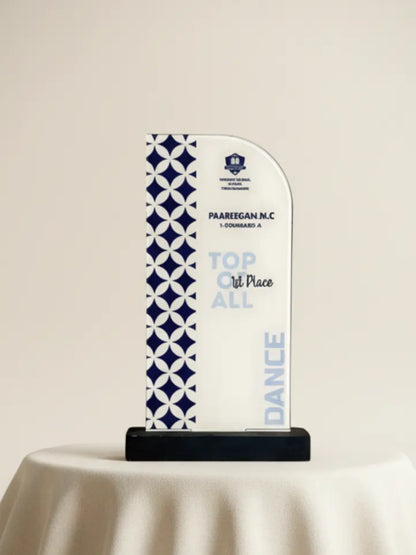 Decorative award with geometric pattern and text on a white background