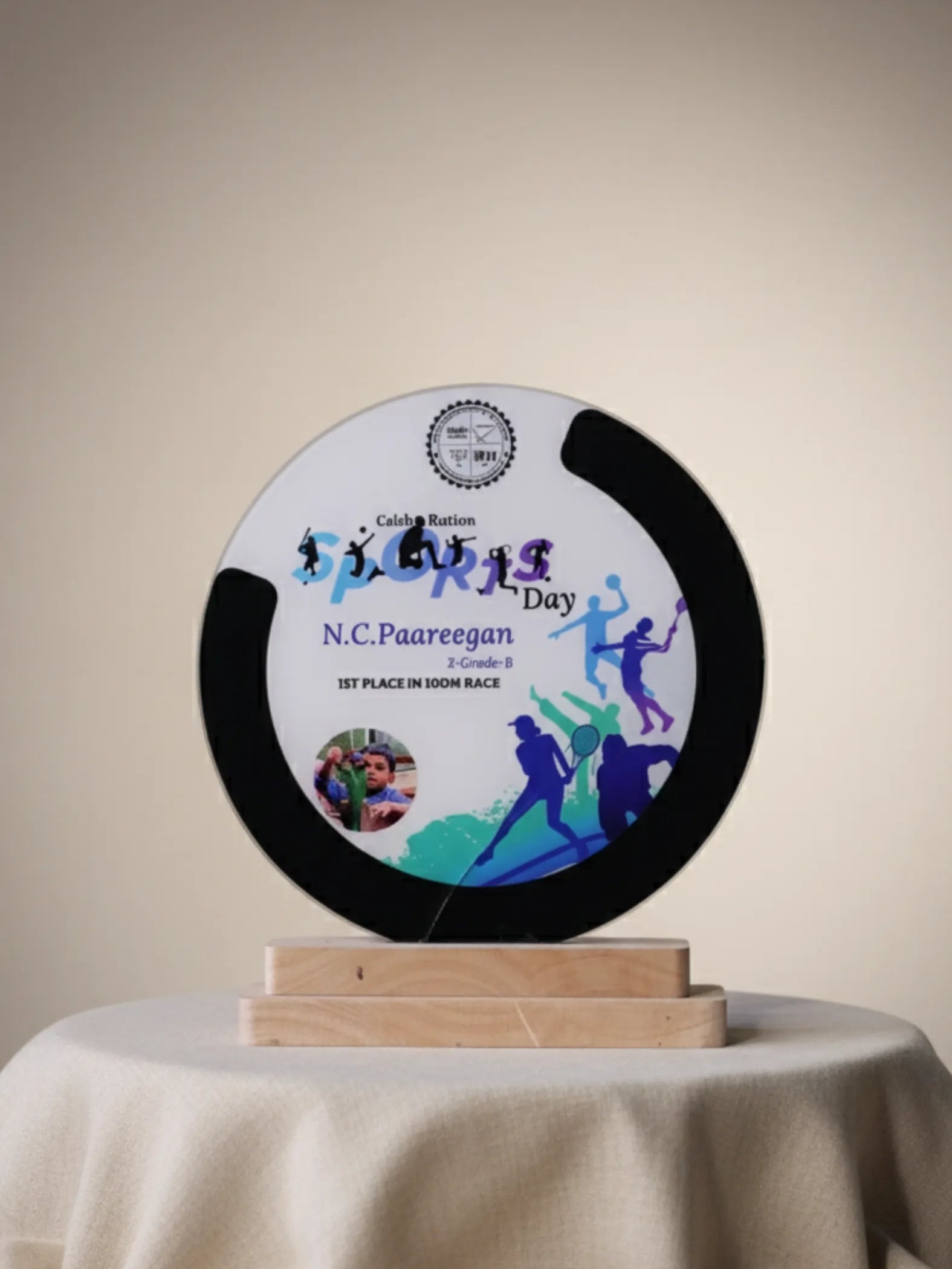 "Premium sports day trophy with runner figure and custom engraved nameplate