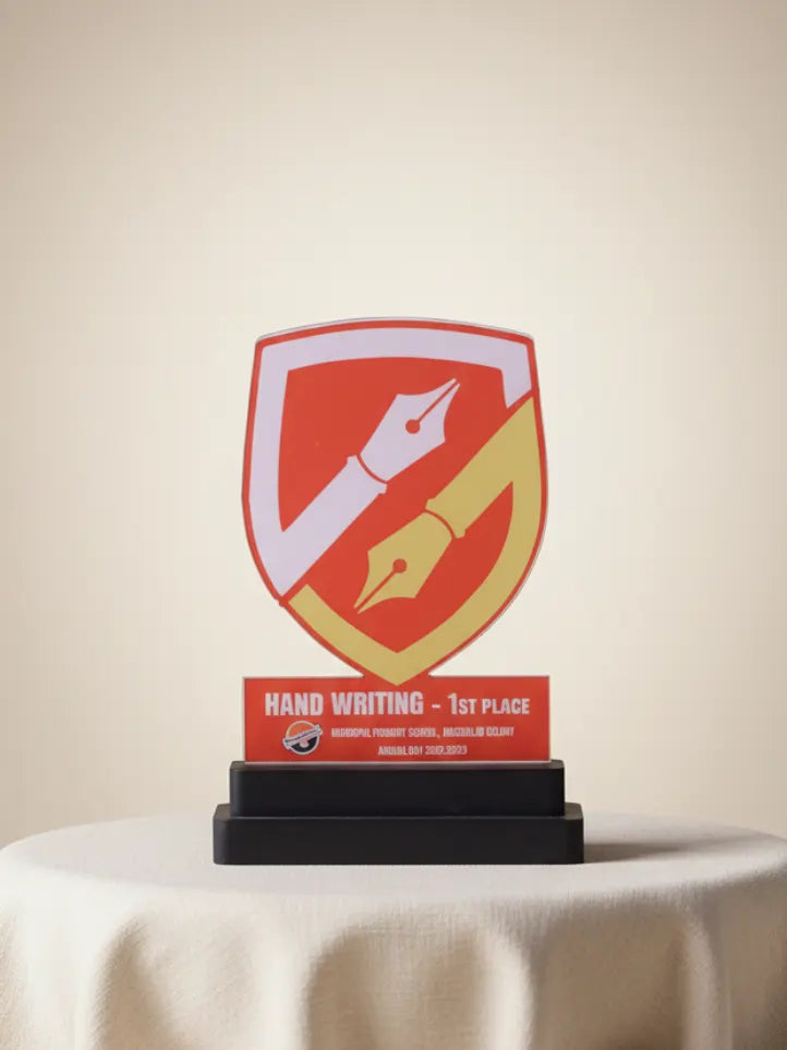 Trophy with a red and yellow design on a white tablecloth