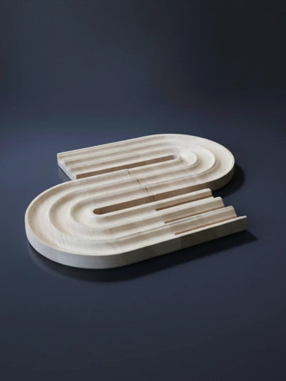 Close-up of personalized pen holder and phone stand showing custom name engraving detail