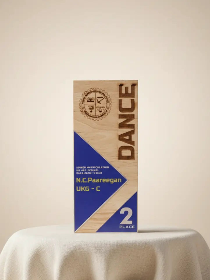 Wooden plaque with 'DANCE' and other text on a beige background