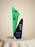 Green and blue award trophy on a beige background