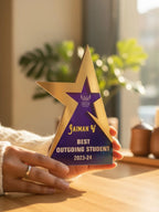 Three trophies of varying heights (small, medium, and large), each designed for different recognition levels and occasions.