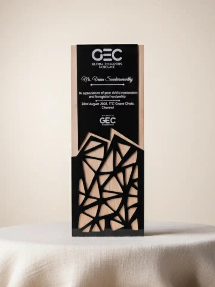 Decorative box with geometric design and text on a beige background