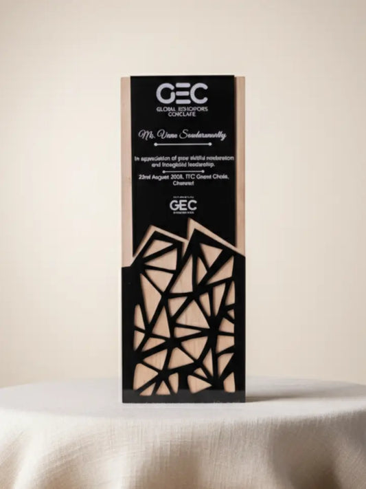 Decorative box with geometric design and text on a beige background