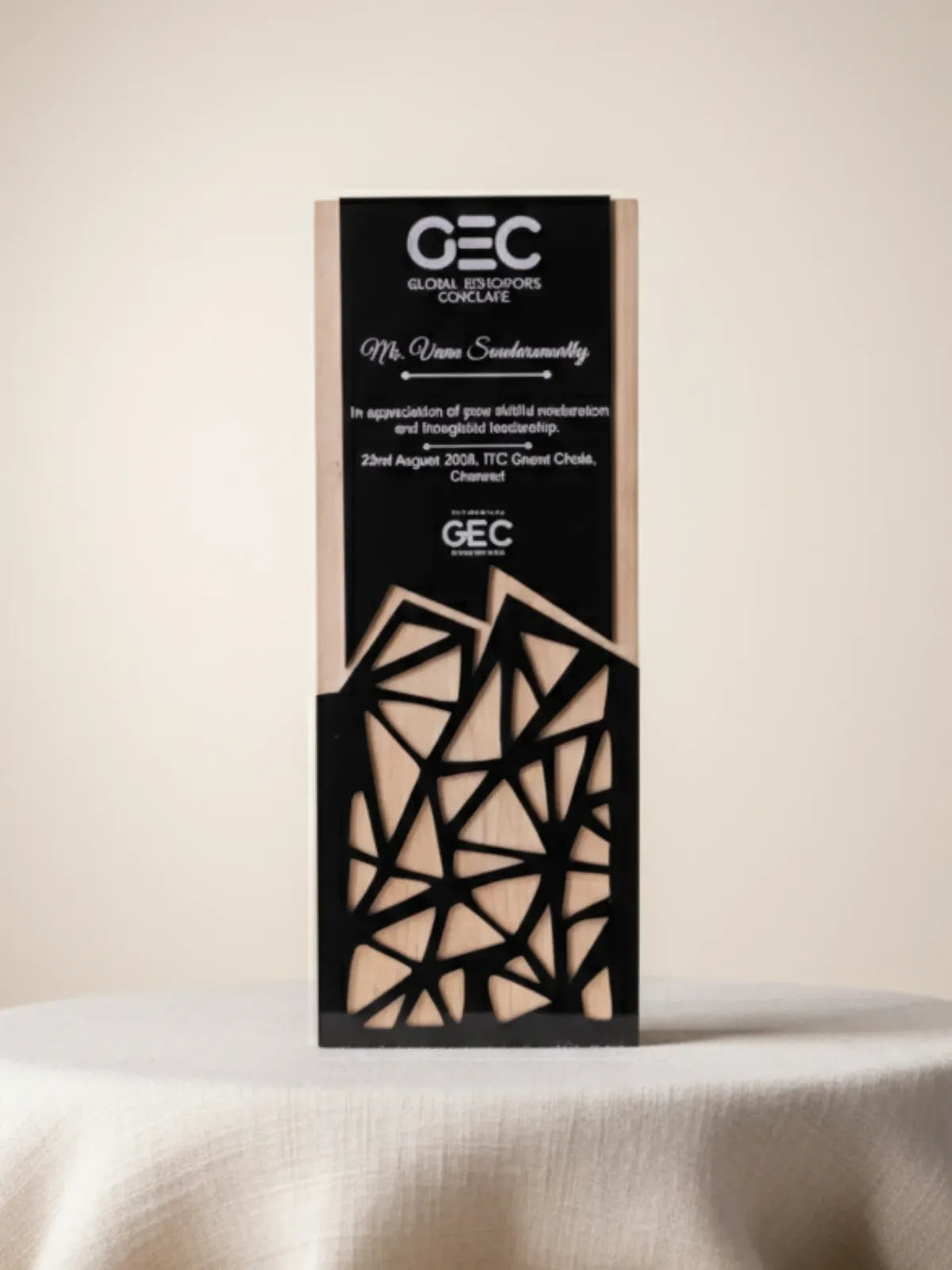 Decorative box with geometric design on a beige background