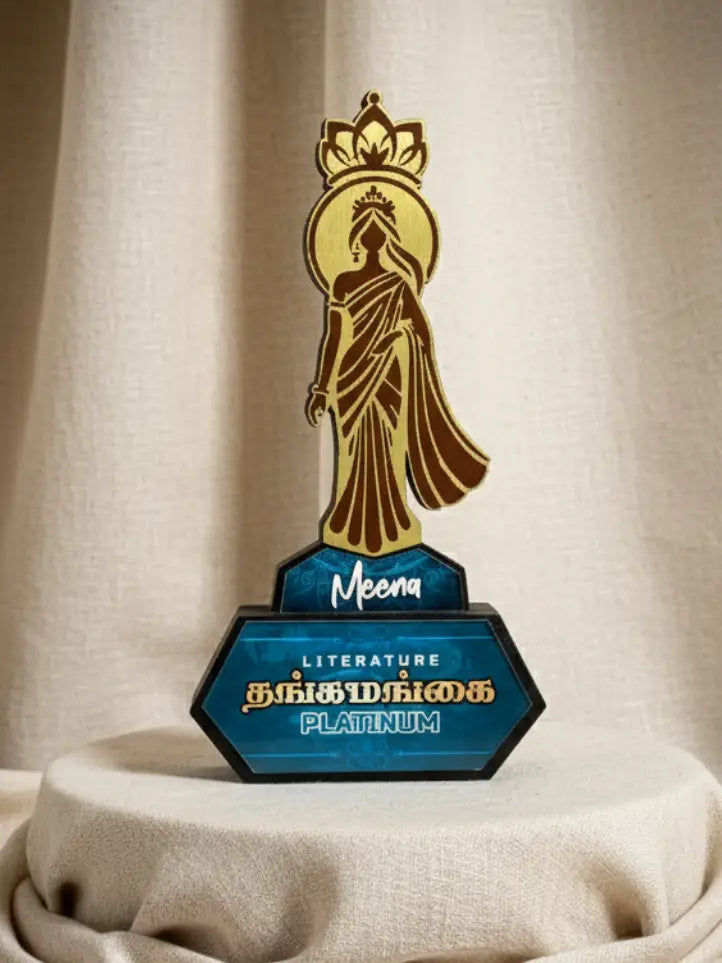 Decorative trophy with a figure and 'Meena' branding on a beige background