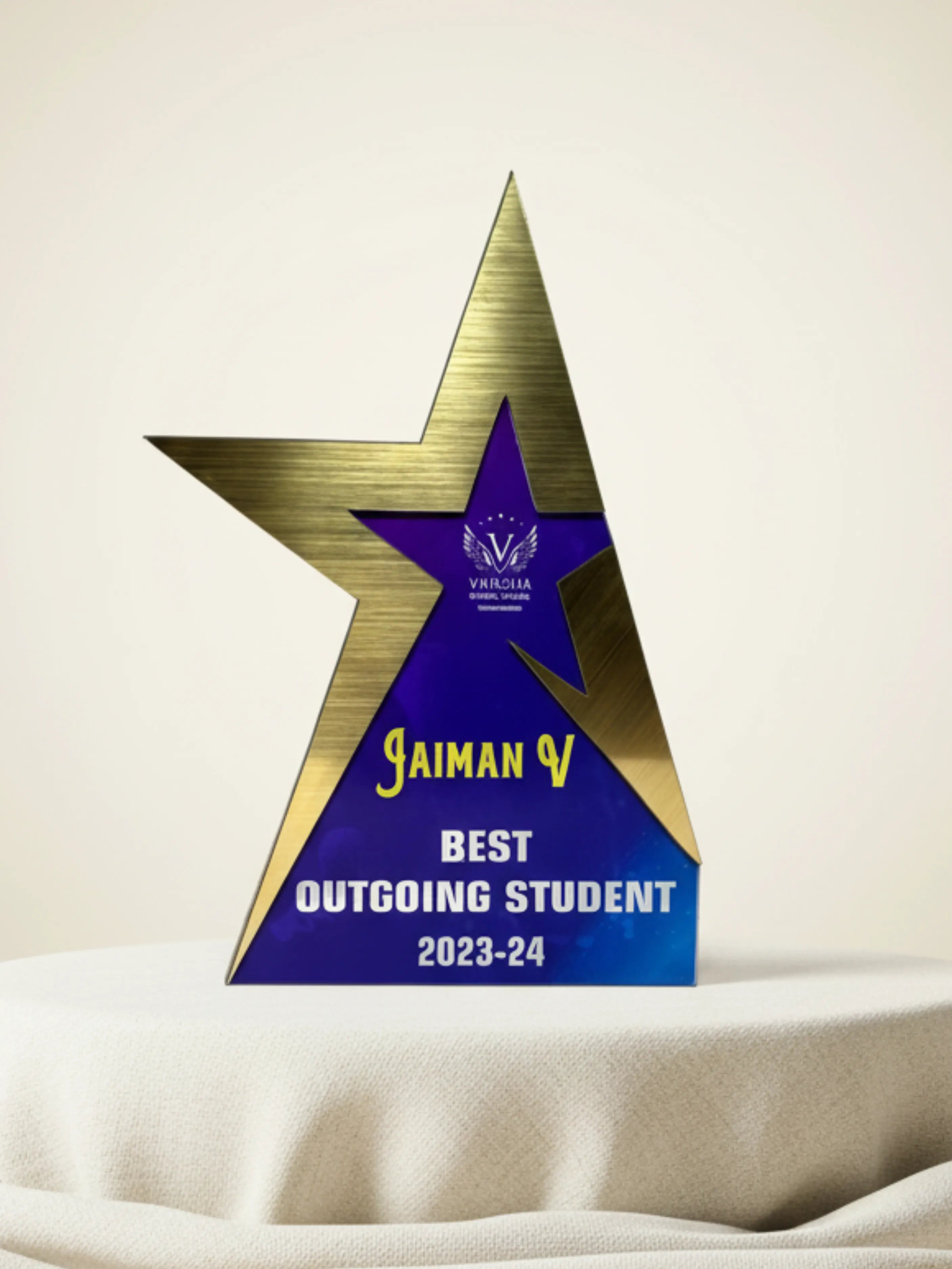 A premium golden star-shaped trophy with a polished finish and decorative base, presented on a clean white background.