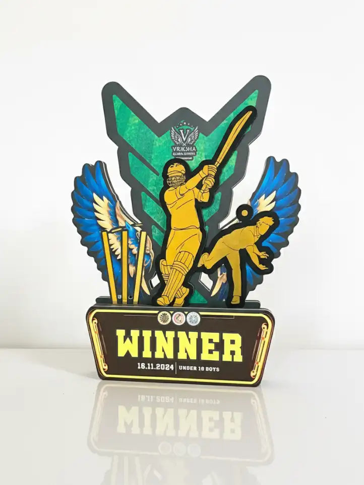 Decorative trophy with a cricket theme on a white background