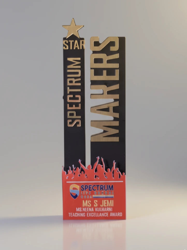 Spectrum Makers award with star design on a gray background