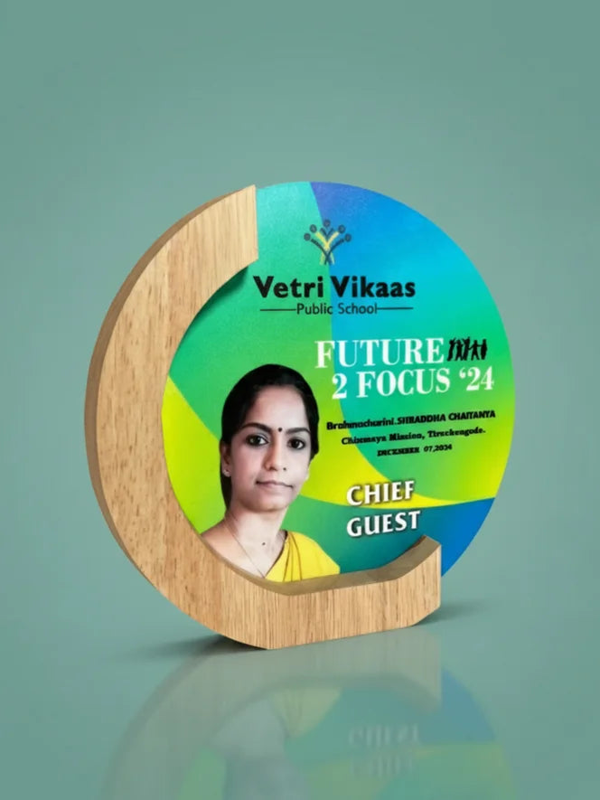 Decorative plaque with a photo of a woman and text on a green background