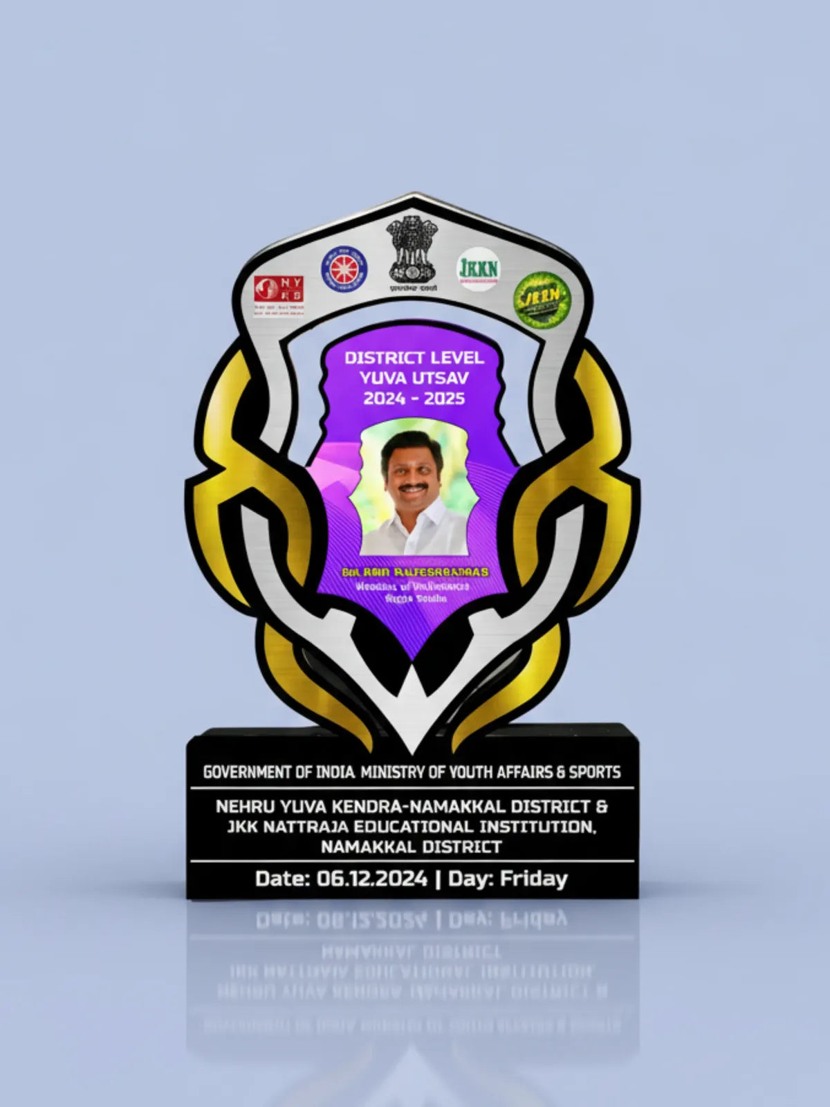 Decorative plaque with text and a photo on a light blue background