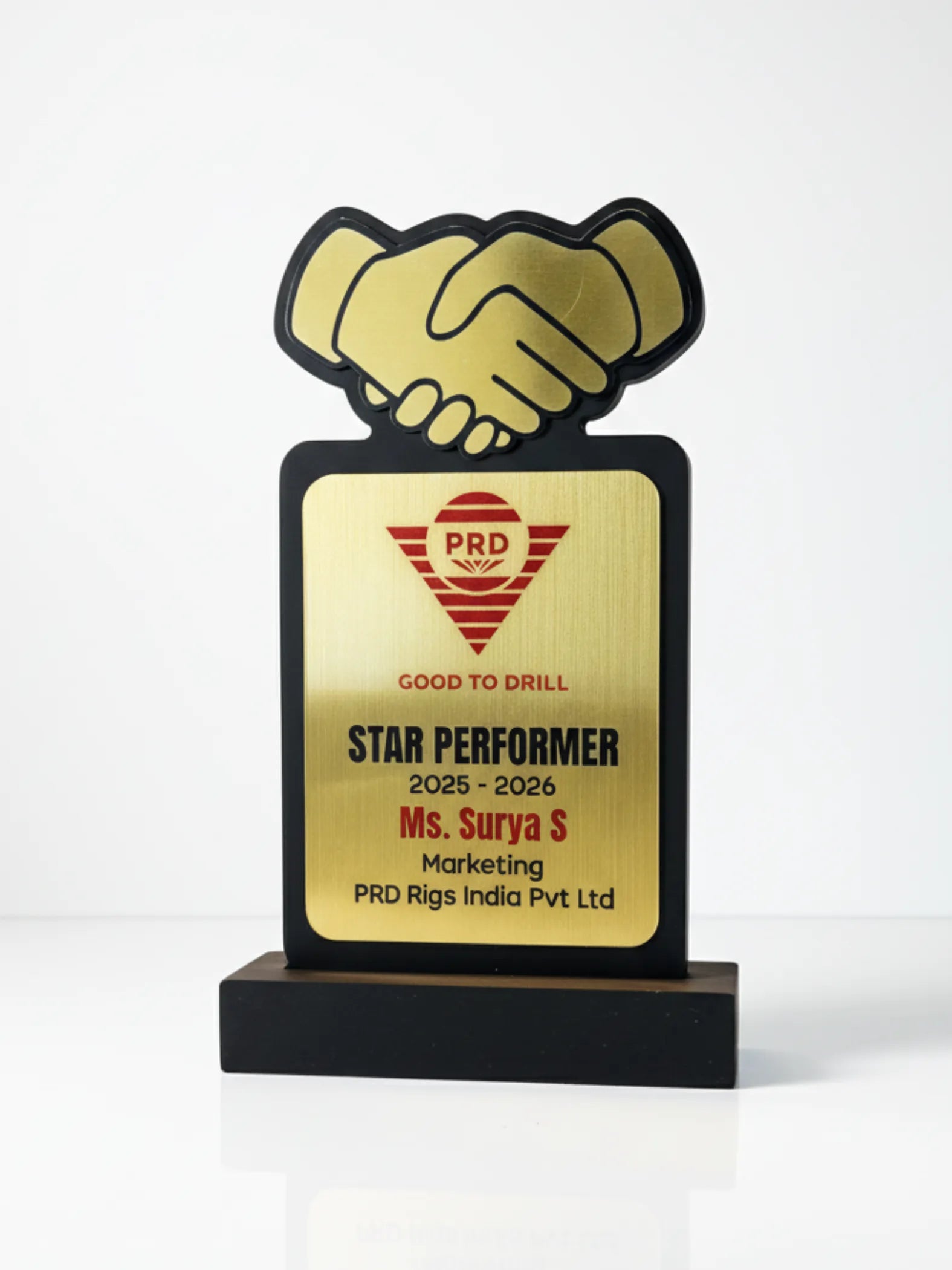 Gold star performer award with handshake design on a white background
