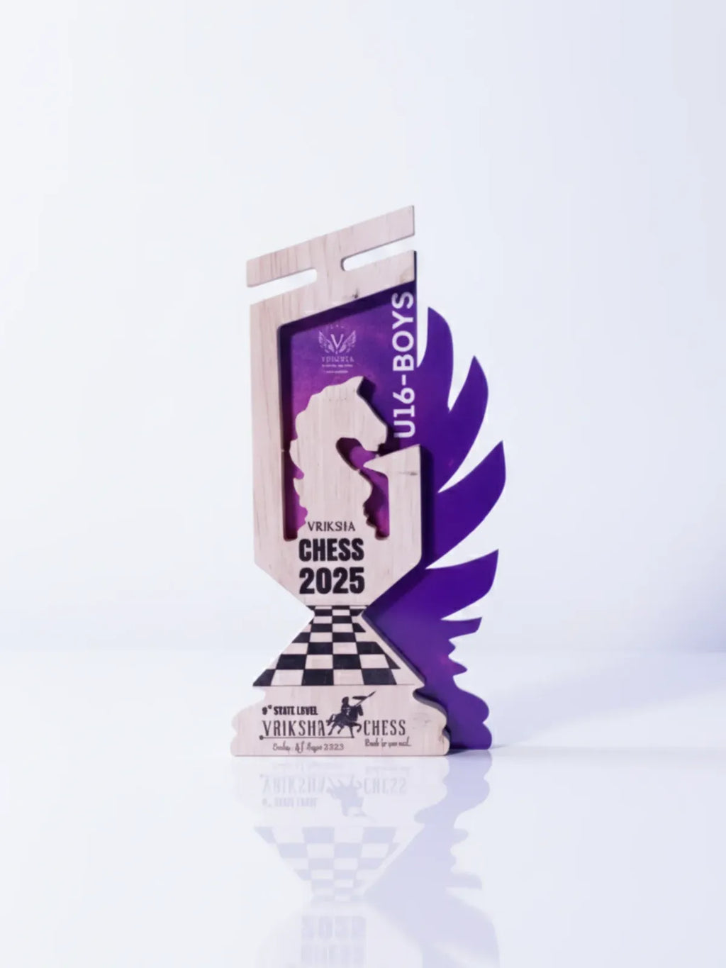 Purple and white trophy with 'Viksha Chess 2025' text on a white background