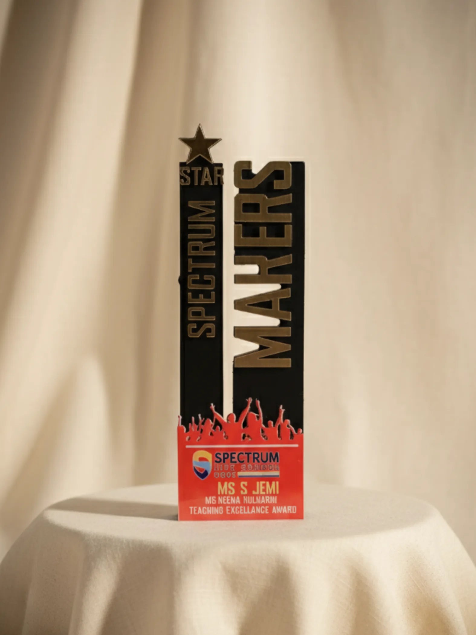 Spectrum Makers award on a beige background