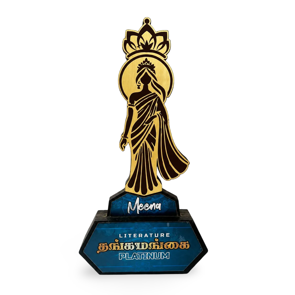 Trophy with a gold figure on a blue base, featuring the word 'Meena' and text about literature.
