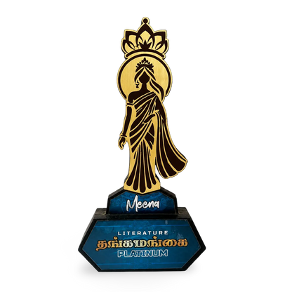 Trophy with a gold figure on a blue base, featuring the word 'Meena' and text about literature.