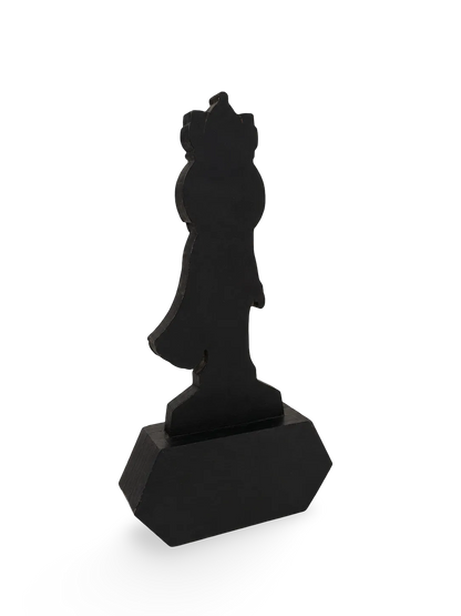 Black abstract sculpture on a white background