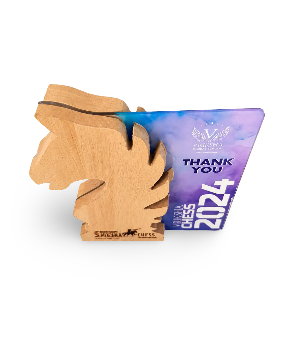Wooden chess piece with a purple card reading 'Thank You 2024' on a white background