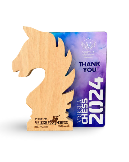 Wooden chess piece with Vriksha Chess 2024 branding on a white background