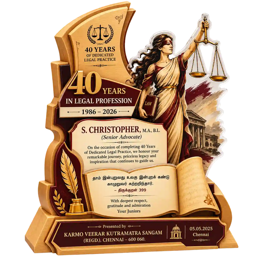 Side view of legal practice anniversary trophy with book and quill details