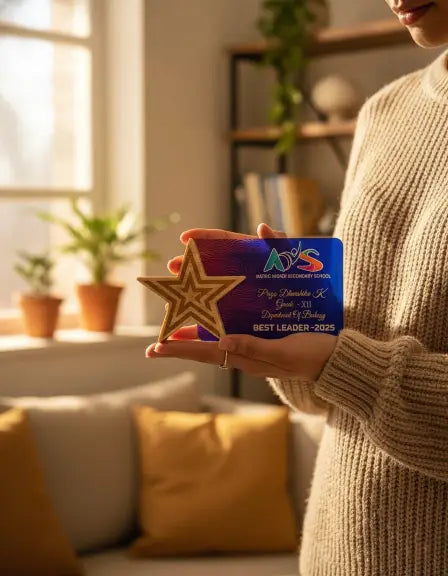 Person holding a star-shaped award in a cozy living room
