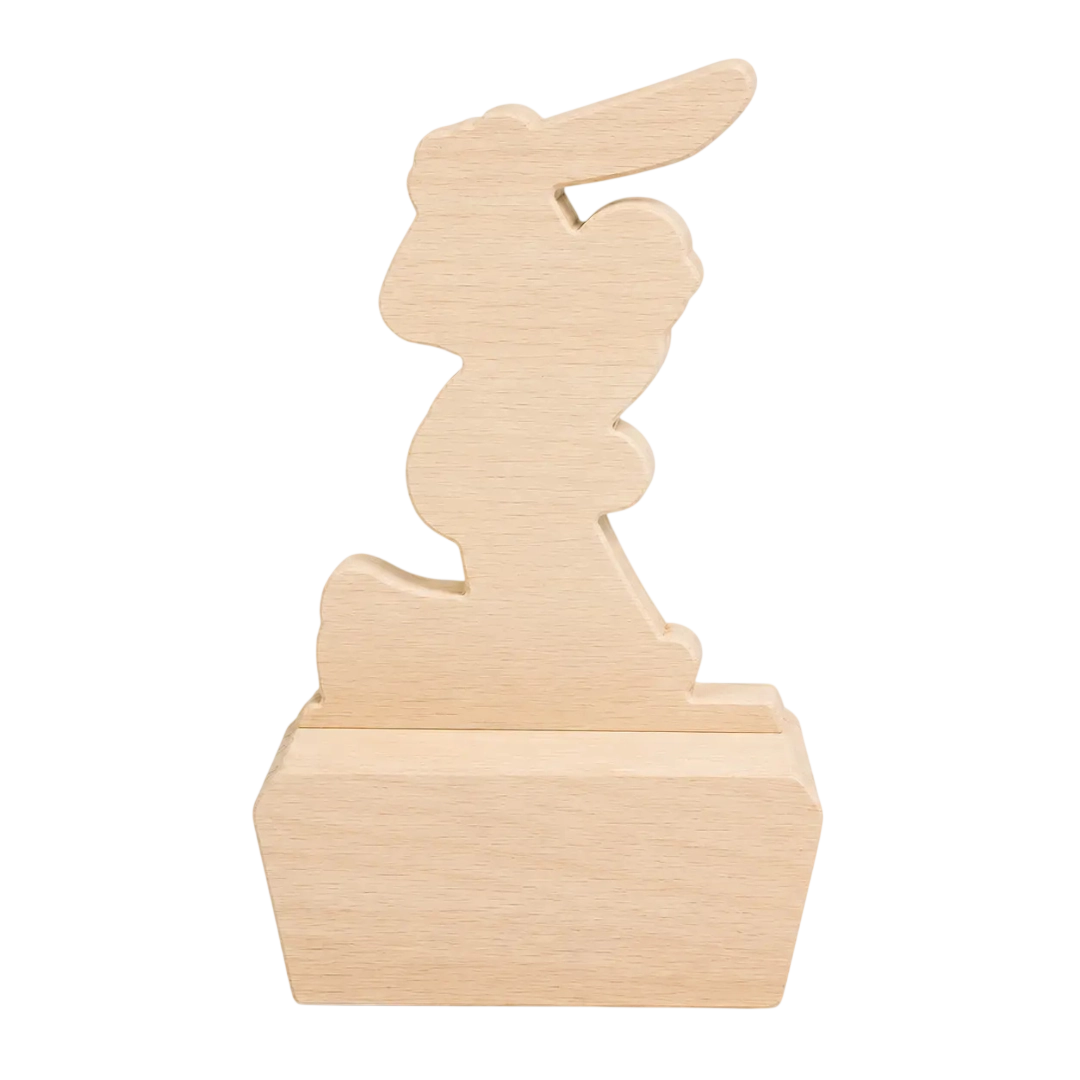 A light natural wood bunny-shaped decorative object mounted on a rectangular wooden base, shown against a plain white background.