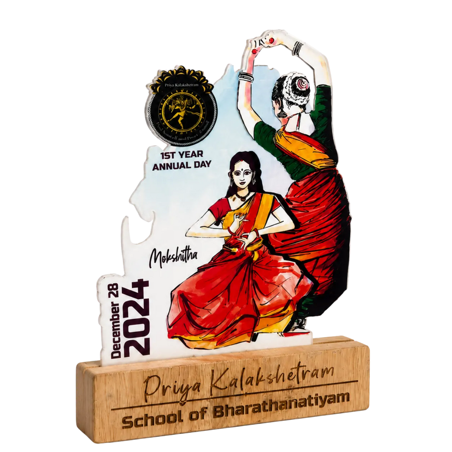 Decorative award with dancer design and text on a white background