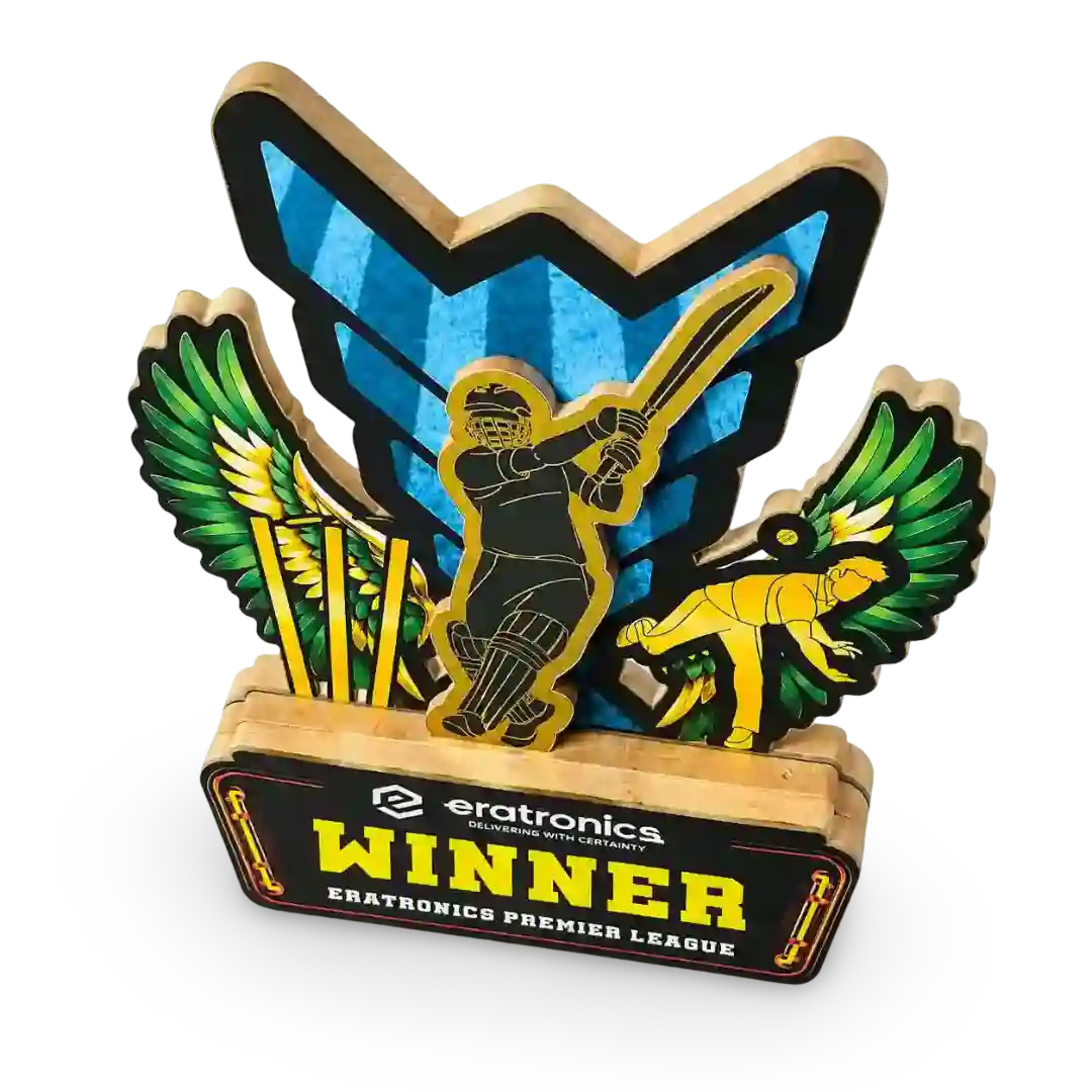 A wooden cricket-themed trophy plaque featuring a cricket player silhouette, green and gold wings, a blue shield, and a base reading 'eratronics WINNER ERATRONICS PREMIER LEAGUE'.