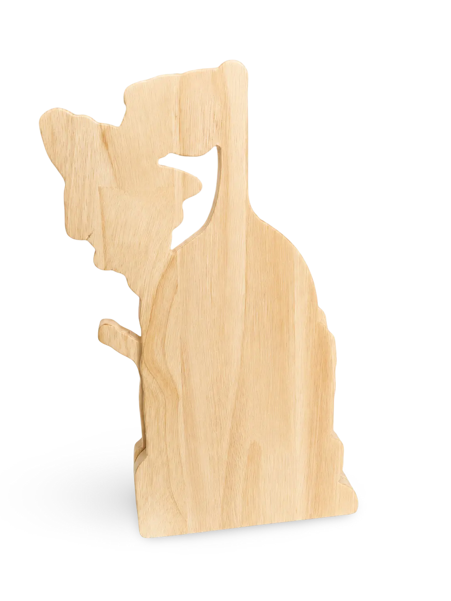 Dog-shaped wooden display board on a white background