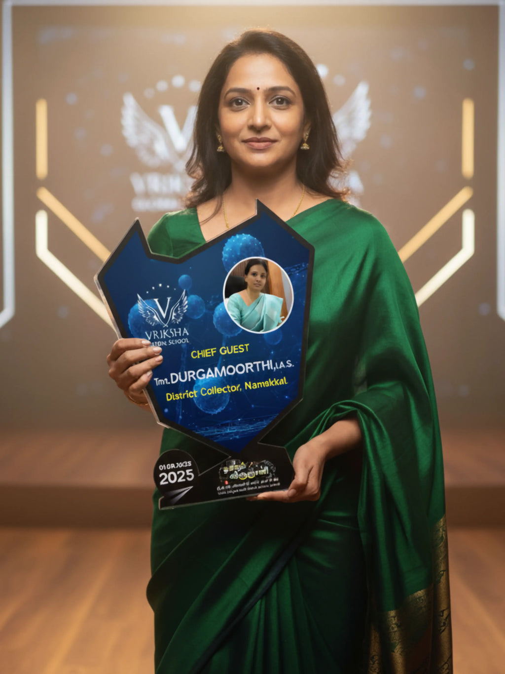 Woman in a green saree holding an award with 'Viksha' branding