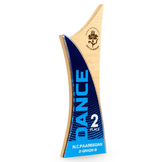 Engraved dancing-figure trophy in wood and acrylic