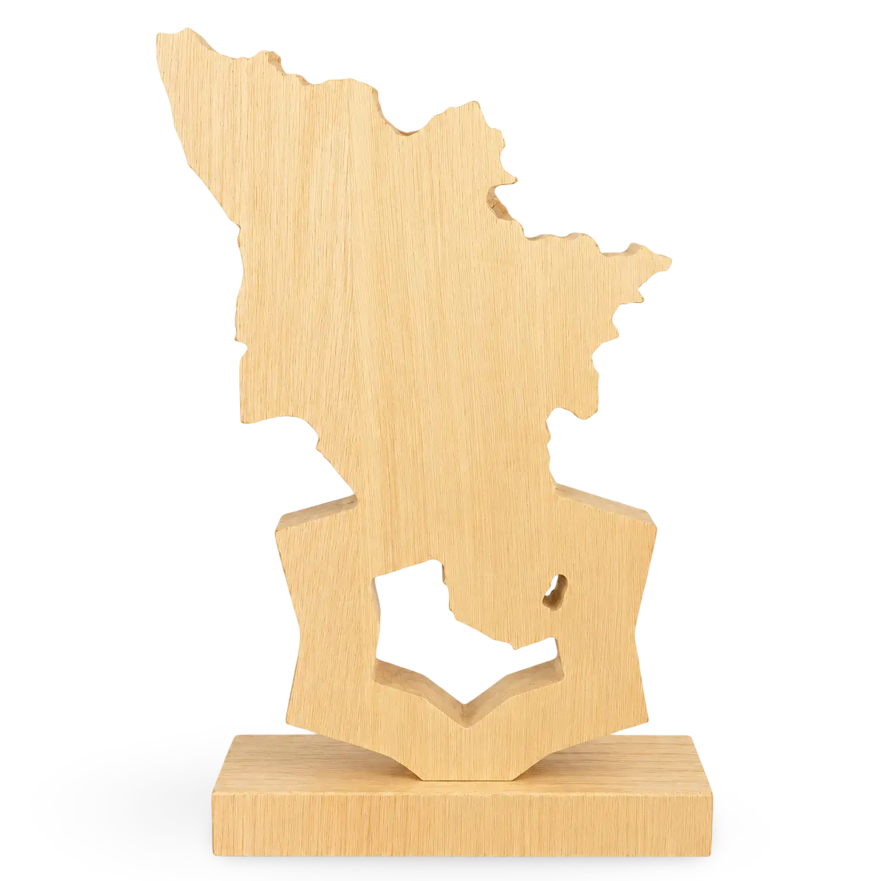 Wooden sculpture in the shape of a stylized face on a white background