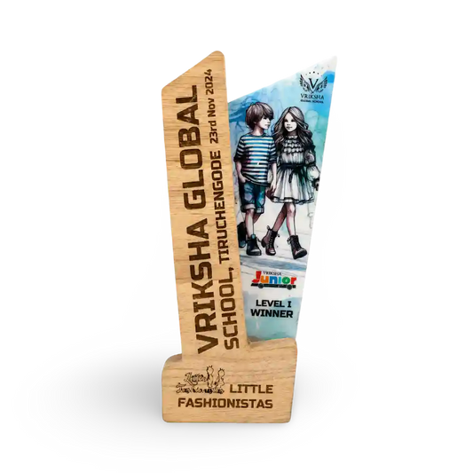 Wooden award with engraved text and a cartoon illustration of two children on a white background