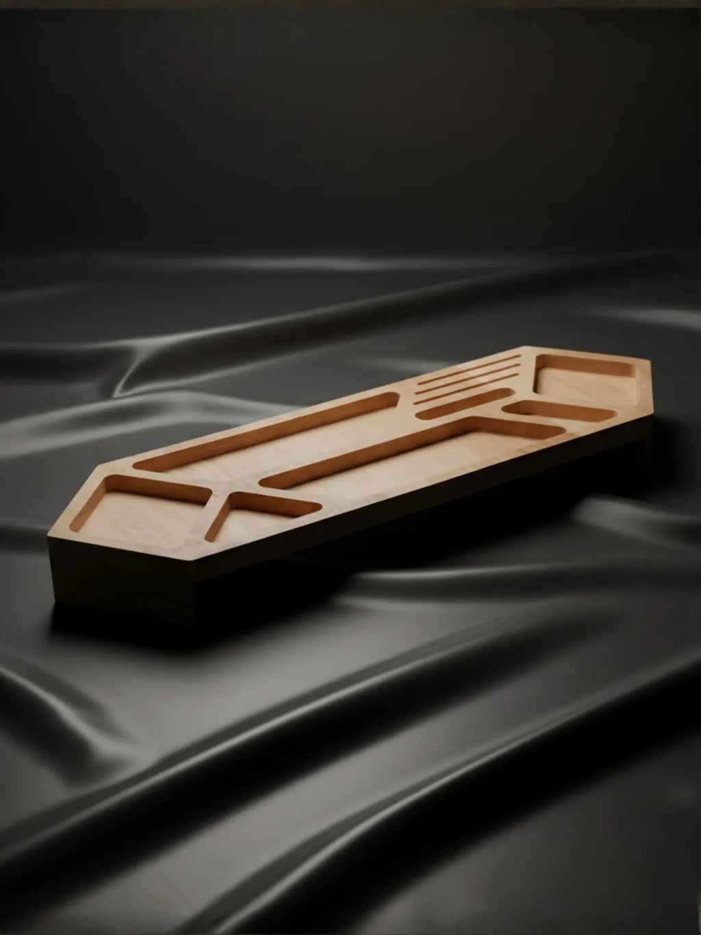 Handcrafted wooden desk organizer tray with multi-compartment geometric design - closeup view natural wood texture