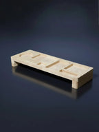 Wooden tray with geometric design on a dark reflective surface