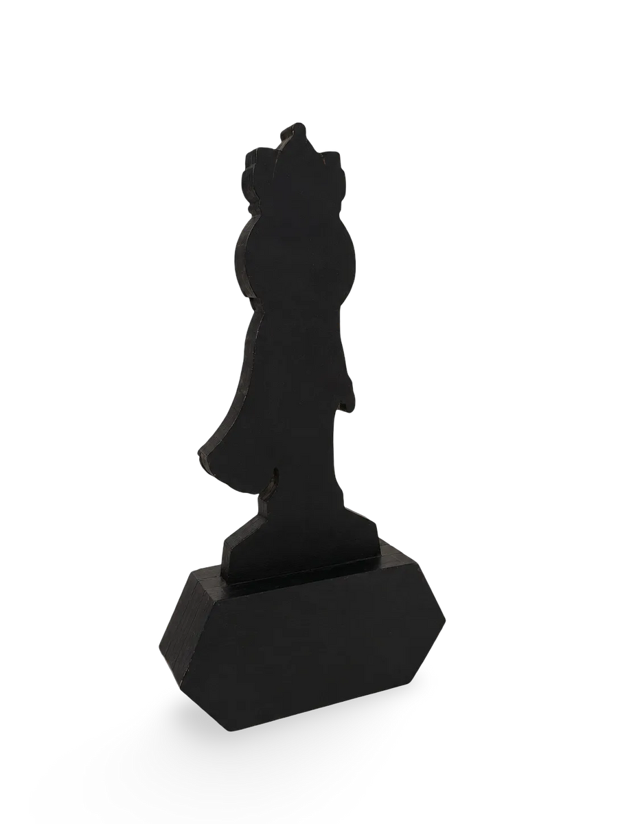 Black abstract achievement sculpture on a white background
